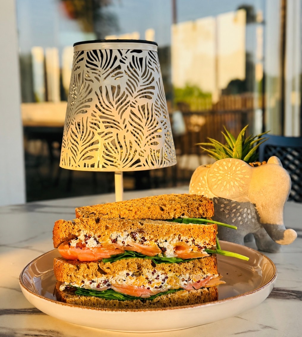 Close-up of a fresh salmon and cream cheese sandwich